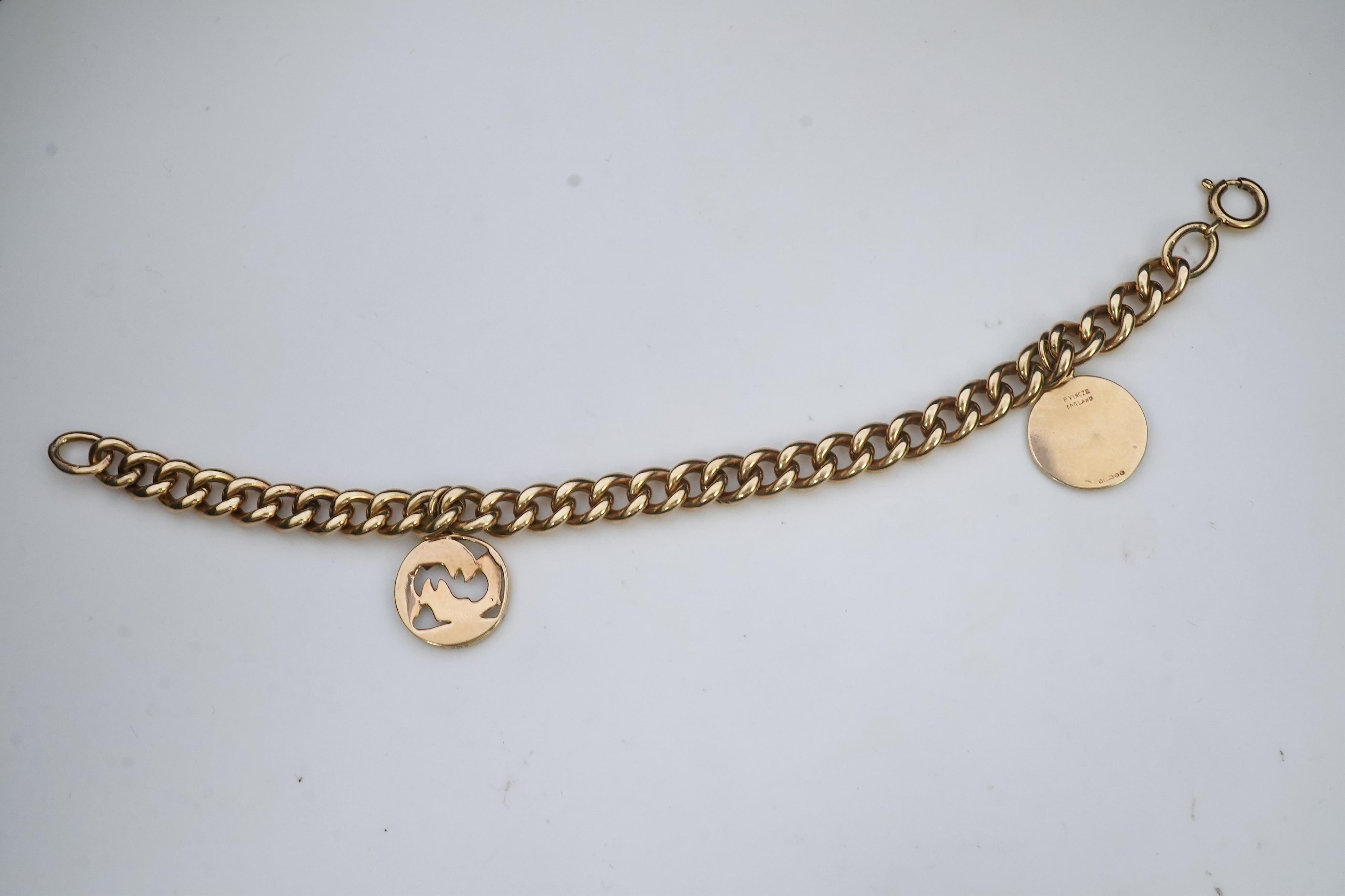 A 9ct gold charm bracelet, circa 1997